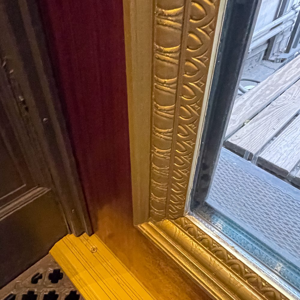 Window frame ornamentation at New York Stock Exchange balcony door