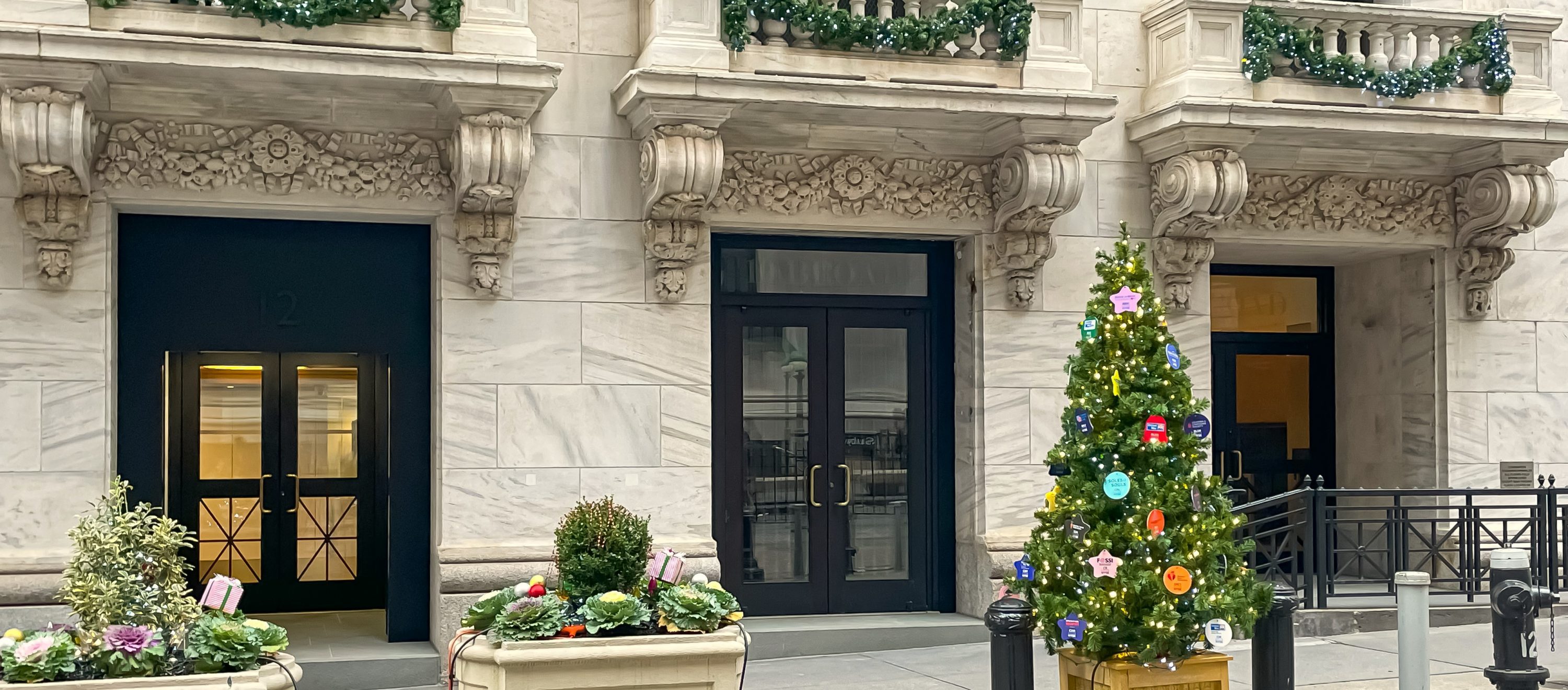 Central entry doors at Broad Street facade of the NYSE Statuary Building