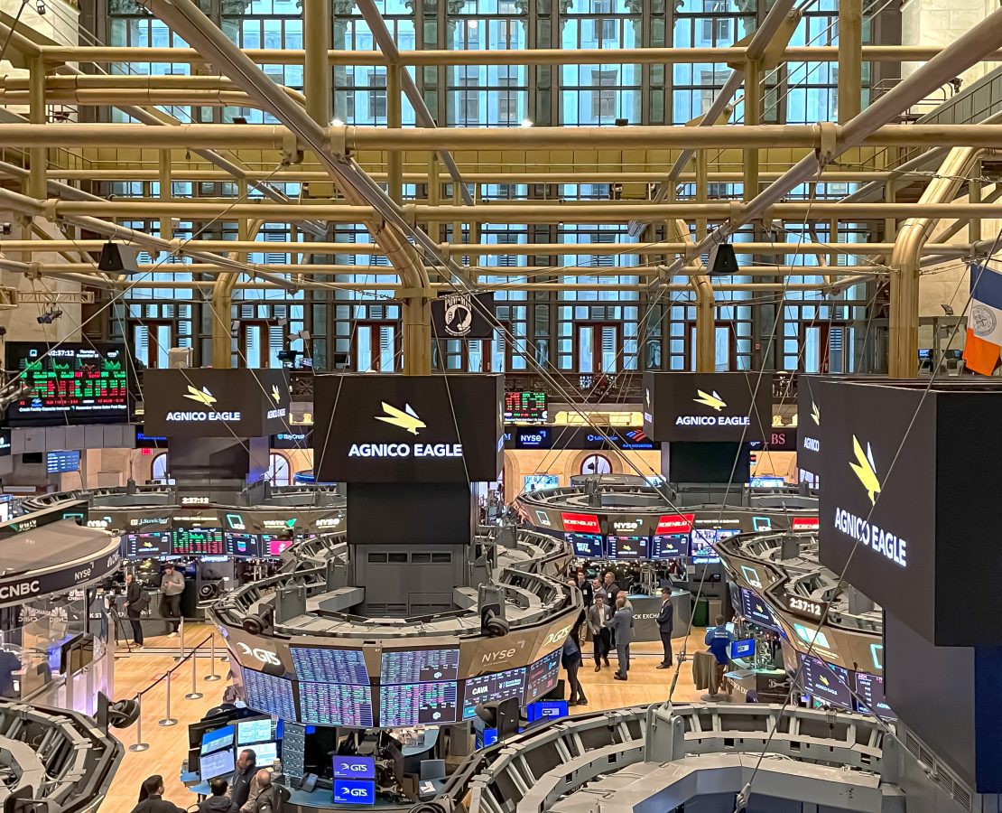 Interior of the New York Stock Exchange trading floor showing balcony doors