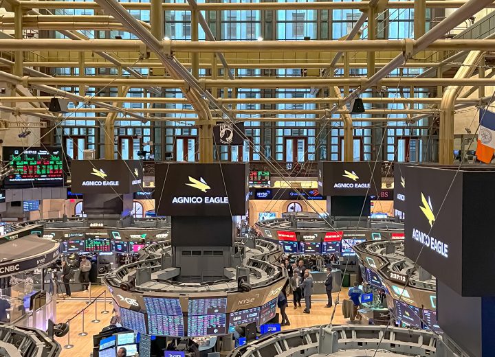 Interior of the New York Stock Exchange trading floor showing balcony doors