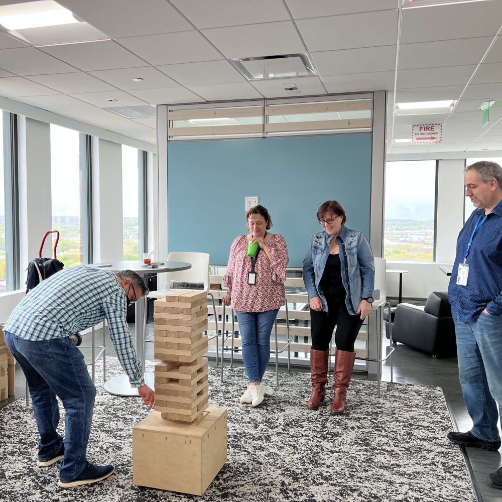 Giant Jenga game in play in an office