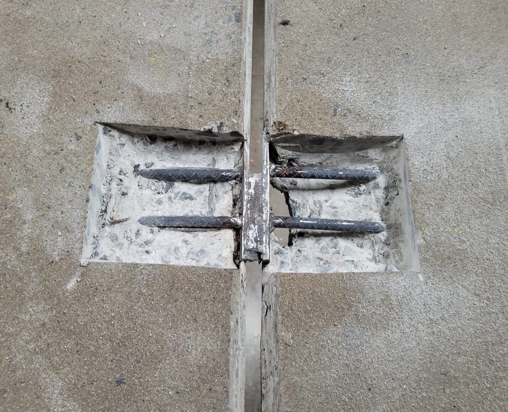 Repair in progress for dissimilar metal corrosion of reinforcing bars.